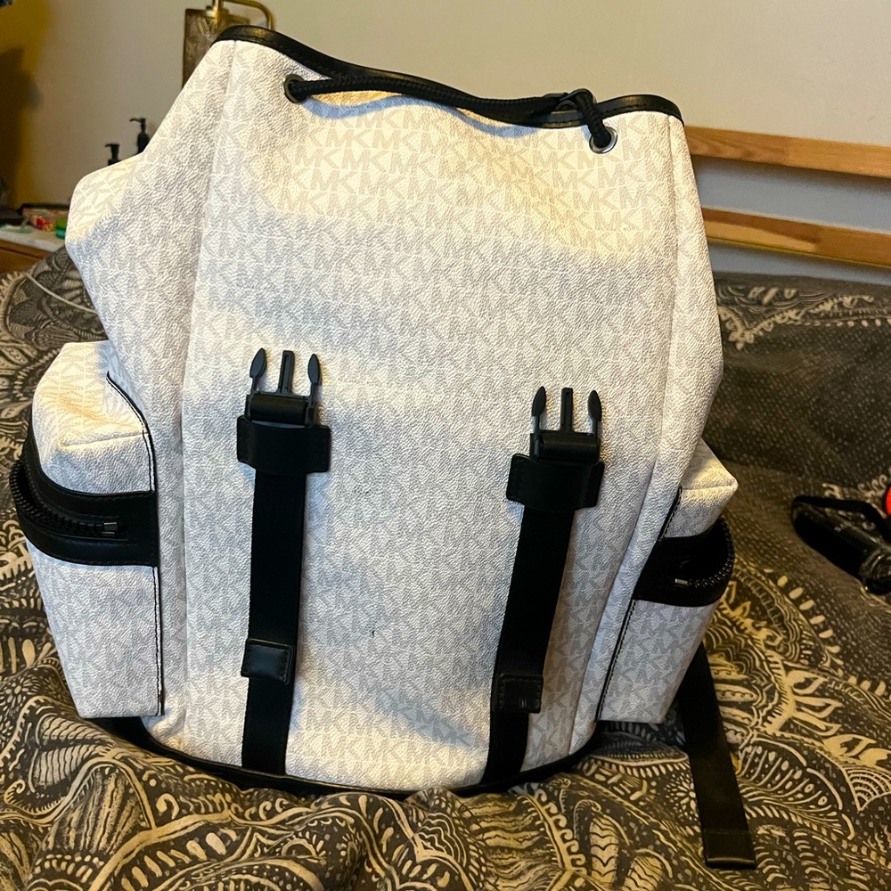 Michael’s Kors book bag barely used, all zippers and buckles work perfectly !